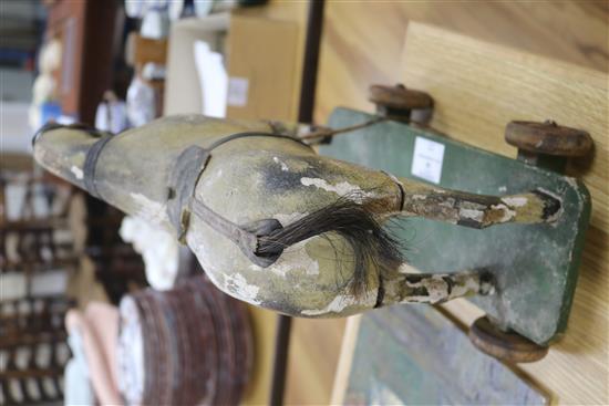 A Victorian painted carved wood pull-along horse